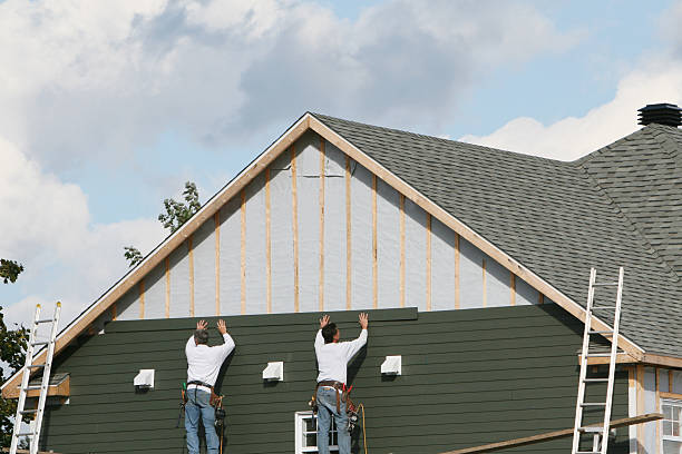 Professional Siding technician working in Hunker, PA
